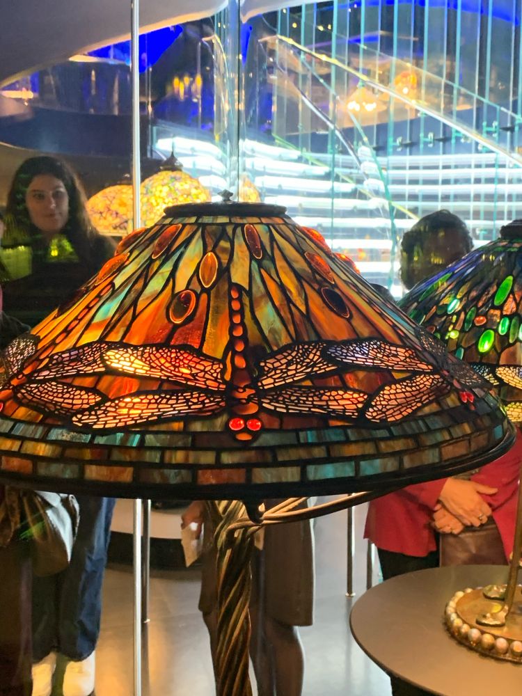 Photo of Tiffany shade with a colorful dragonfly. 