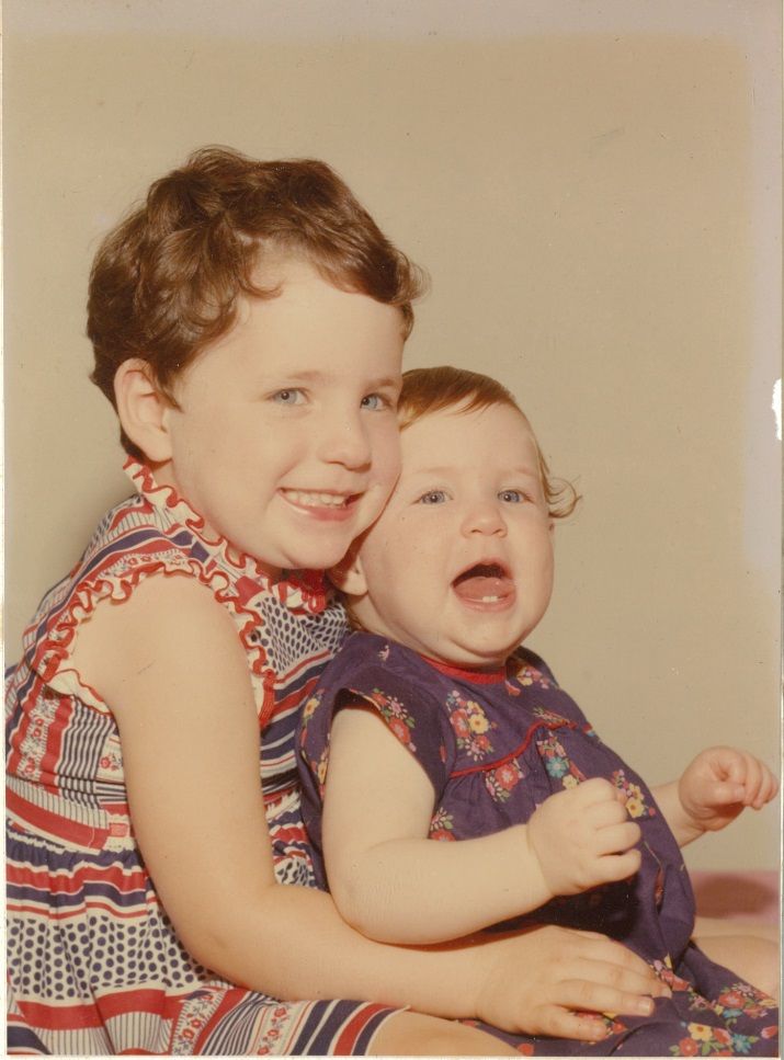 A photo of two very young children.