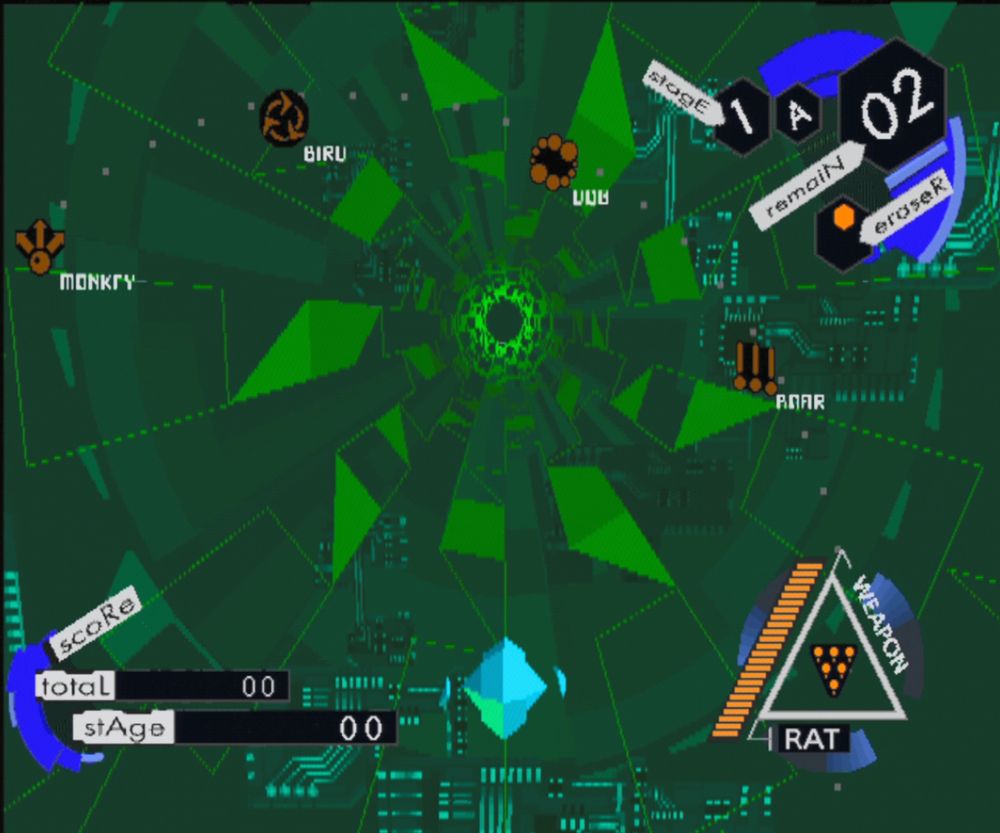 A gameplay snap captured via GBS-C and our PS1 of the virtual reality-themed tube tunnels, all glowing circuitry and grid lines and splintered triangles with an abstract player ship that changes shape with the Chinese Zodiac named weapon you use (rat, dragon, monkey, etc)