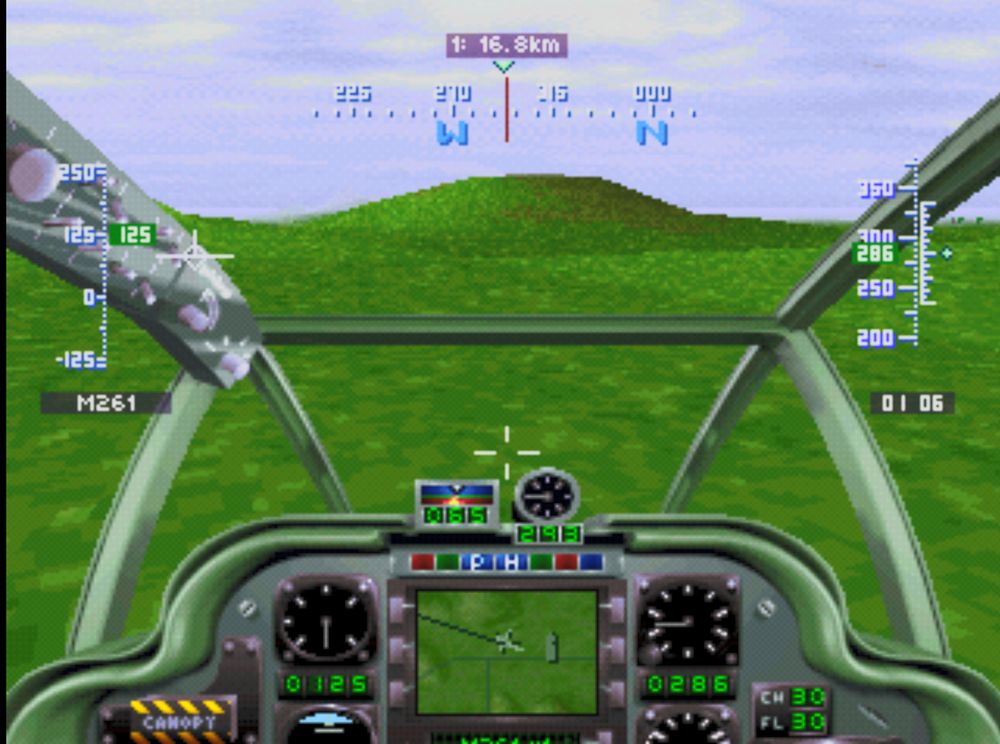 A gameplay snap showing the cockpit view and green texture-mapped landcape