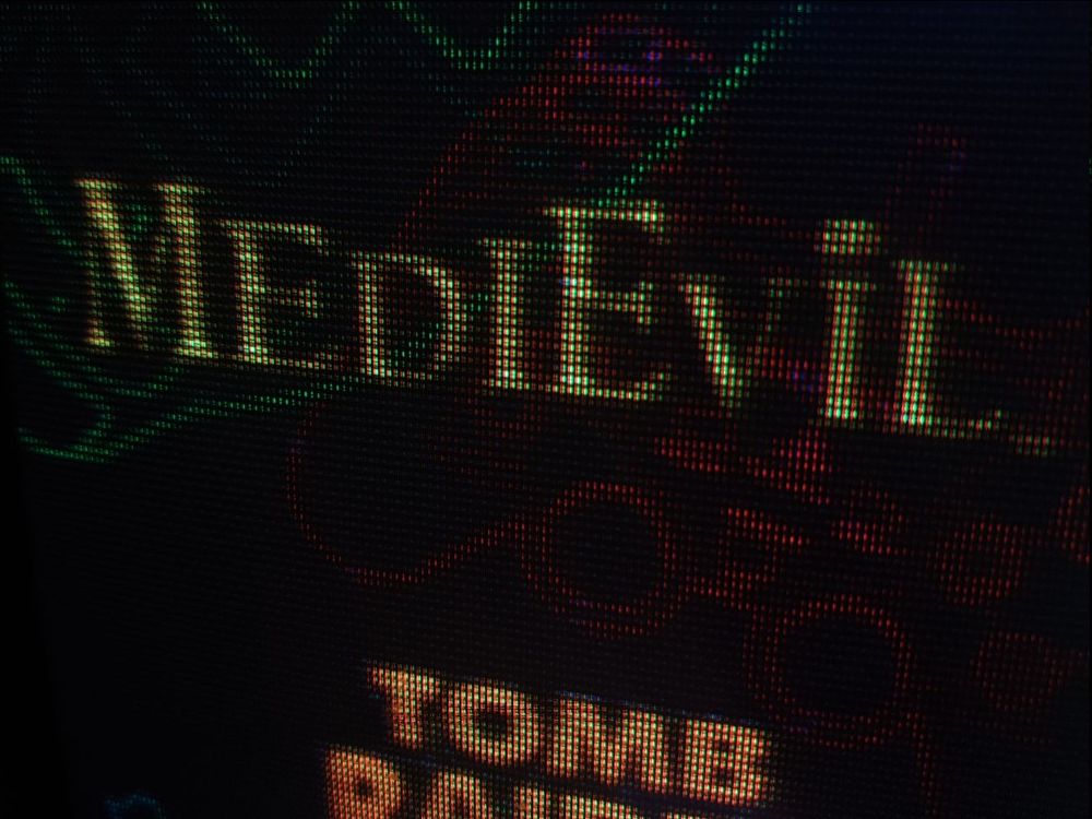 A close-up of the Medievil logo in all its goodness! Plus a good look at those gorgeous neon pads!