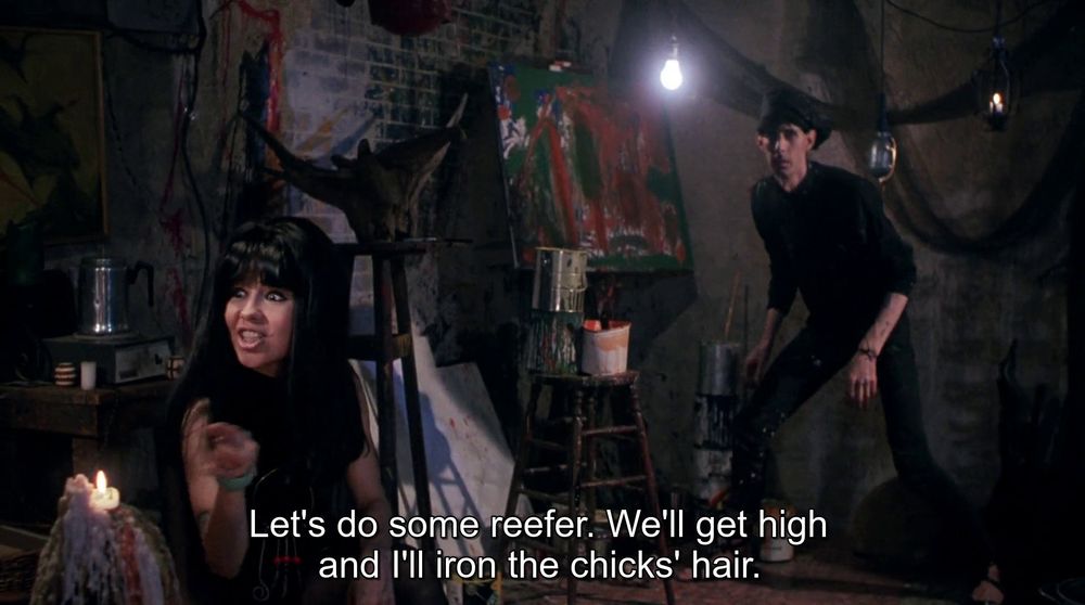 Beatnik Pia serving up some reefer and offering her hair-ironing services.