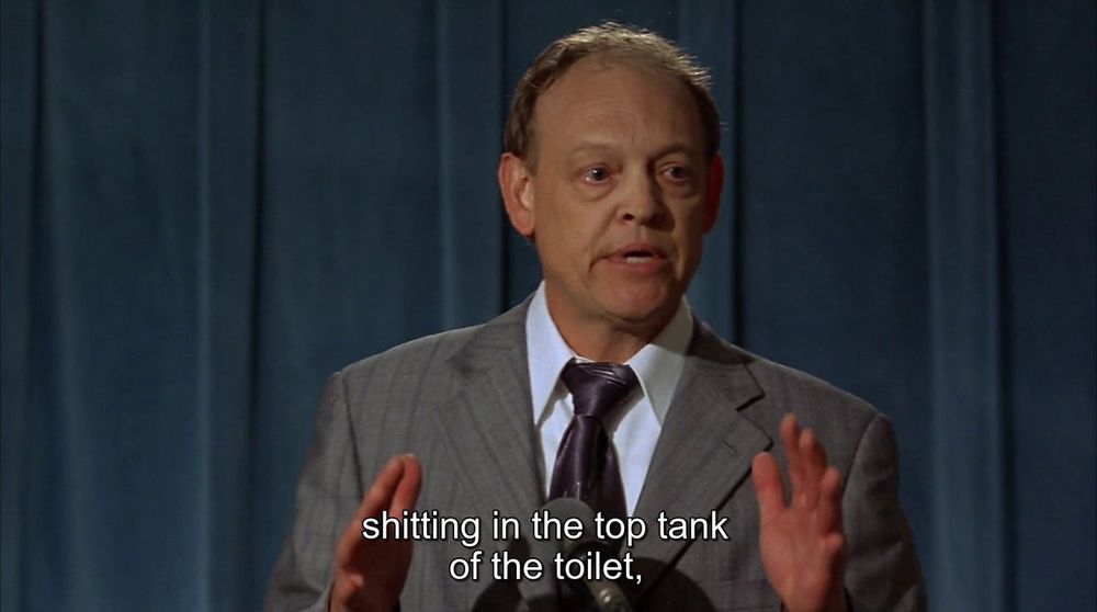 shitting in the top tank of the toilet,