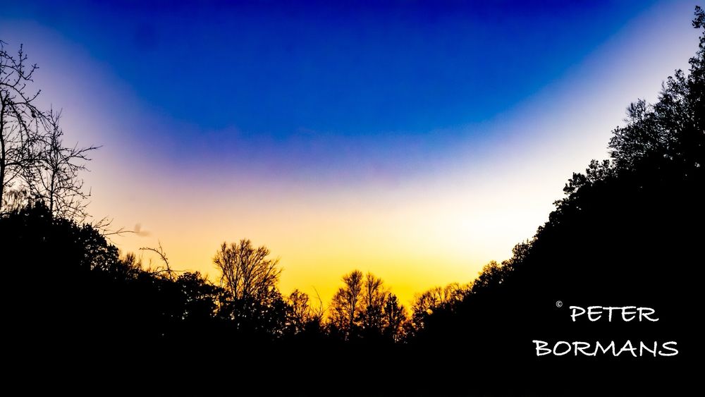 Sun setting over nature reserve Domein Nieuwenhoven - Belgium 
