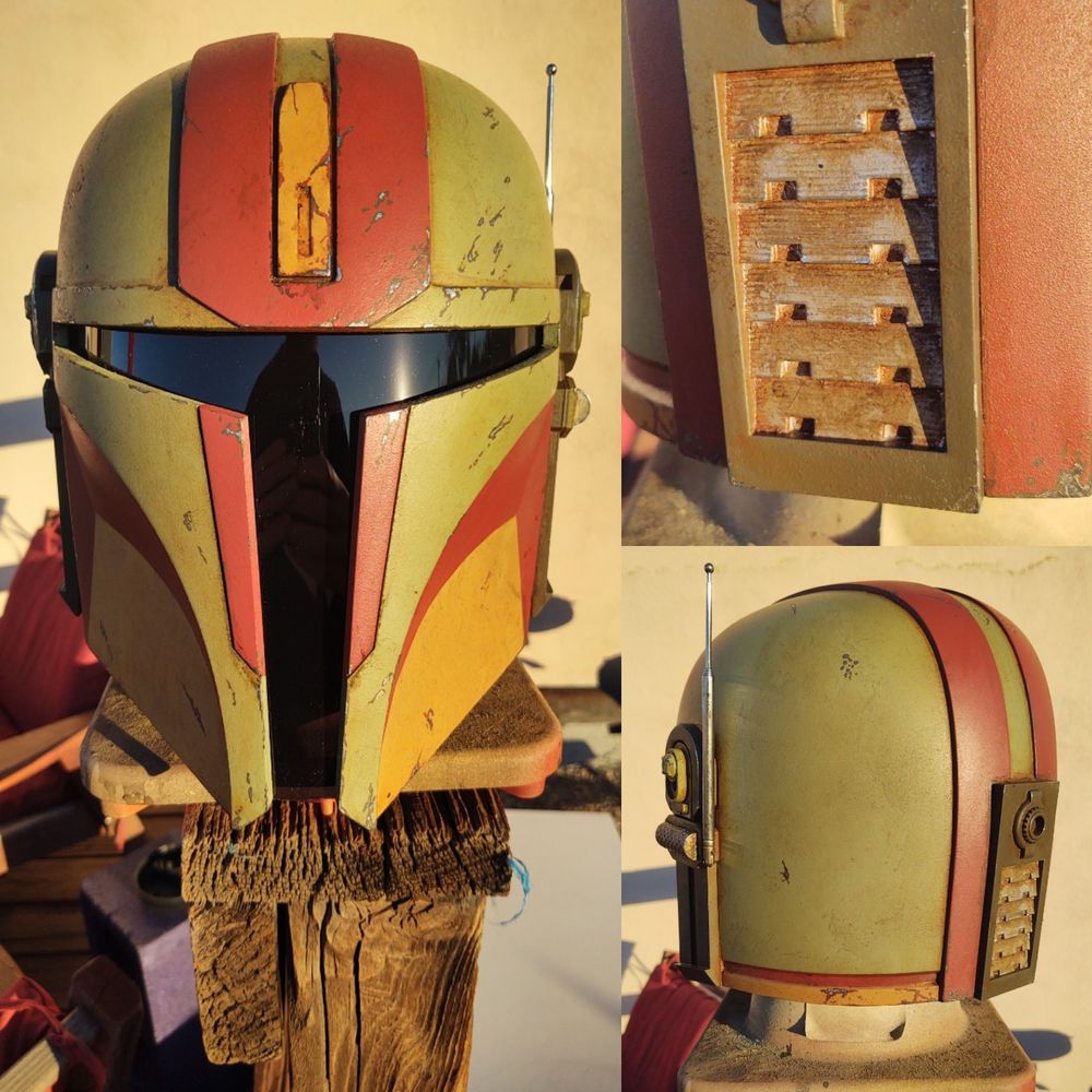 Mandalorian helmet in green, red, and yellow, photographed at golden hour. 