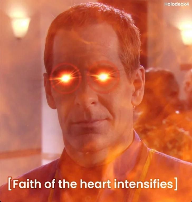 Archer from Enterprise but with red eyes and a fiery background. Caption: [Faith of the heart intensifies]