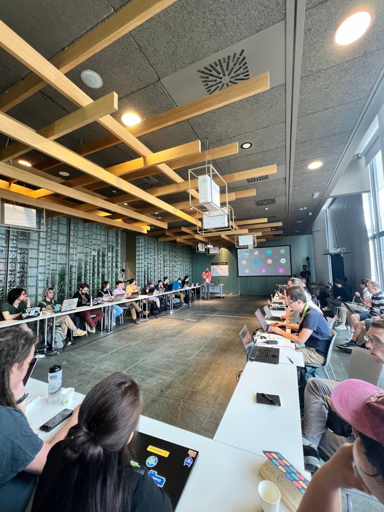 multiple people in room attending servo breakout session at web engine hackfest