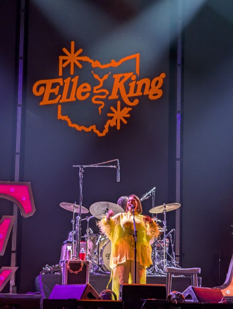 Elle King in front of the drums on stage