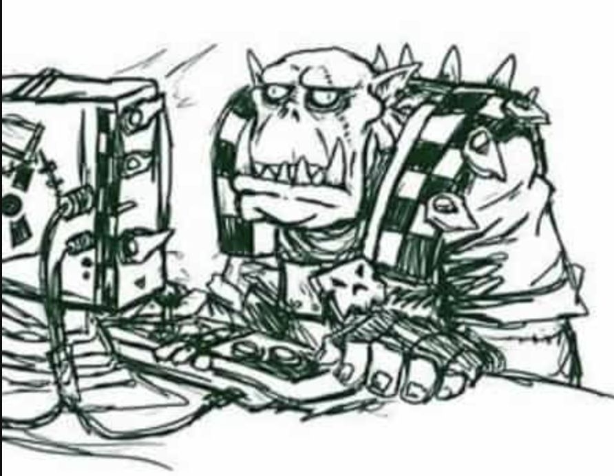 A confused Ork at a computer 