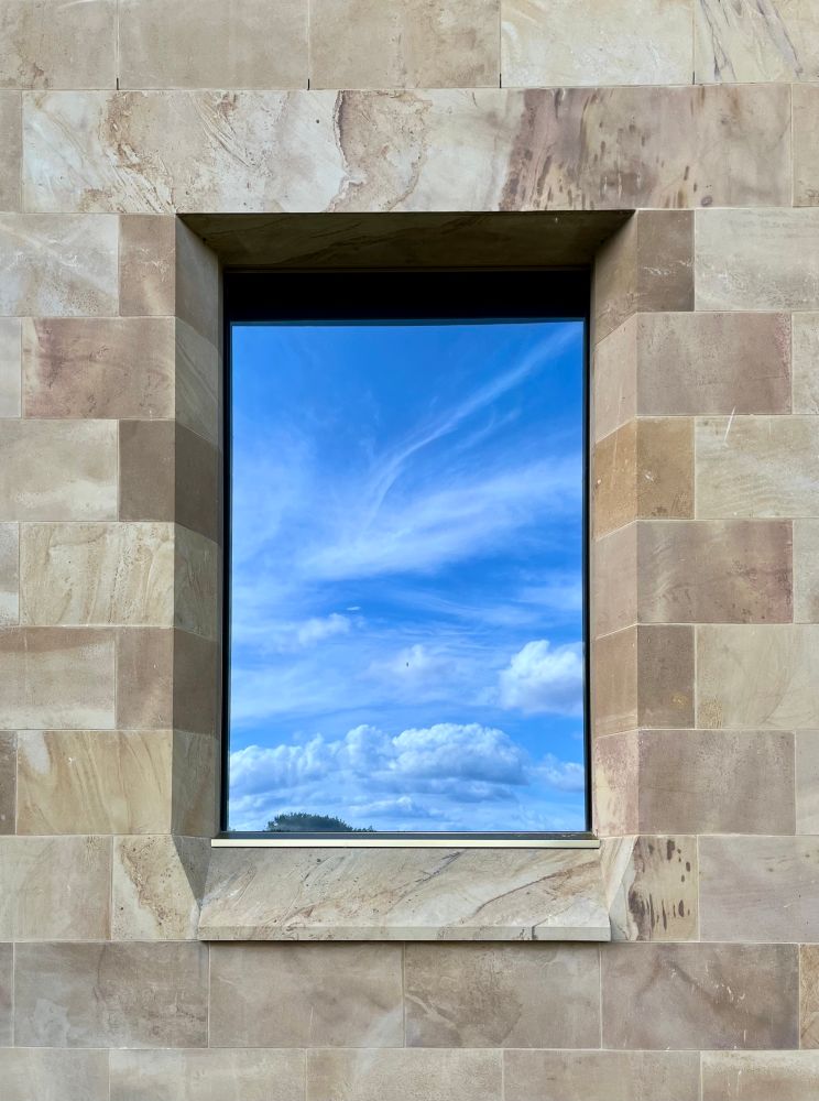 Sky reflected in the window of the Faith Museum, Bishop Auckland 
