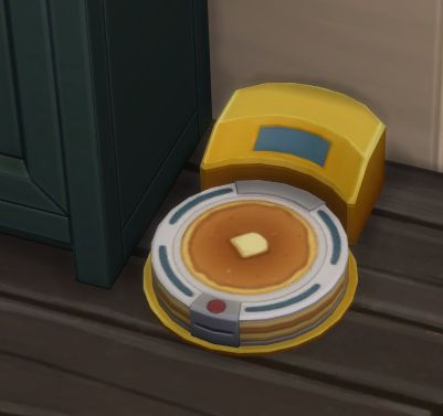 Sims 4 item High-End Robot Vacuum with the orange swatch. The vacuum looks like a little stack of pancakes with a pad of butter on top.