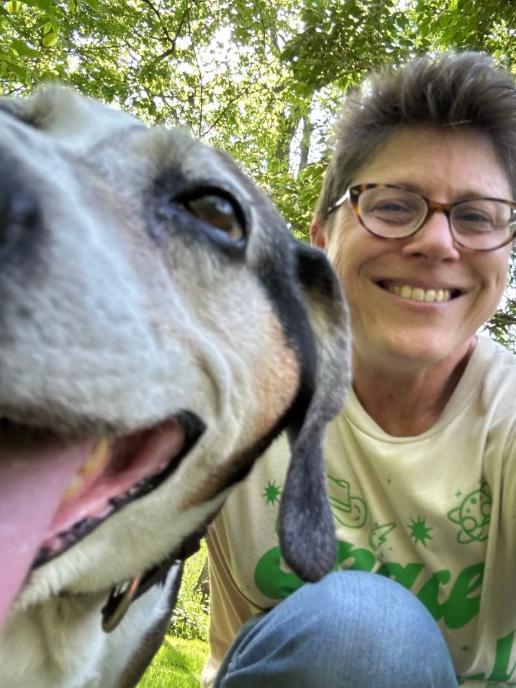 This is me and my dog with him showing a big happy smile. 