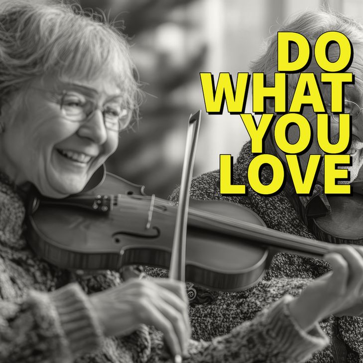Do What You Love
Older woman playing the violin and smiling. Black and White photograph.