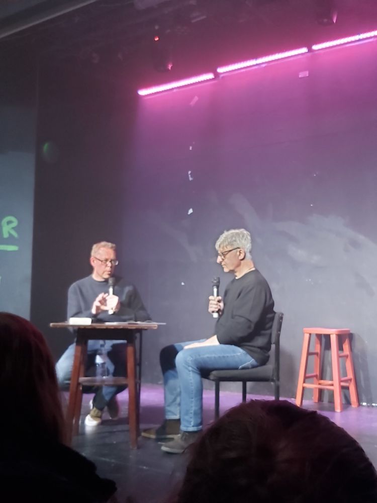 Nick Quantrill talking to Nick Triplow on the stage at Park Street Performing Arts Centre 