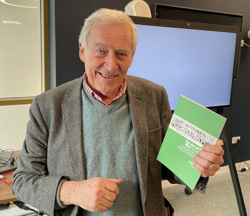 Nick Jones holding a copy of his latest book, published by the Campaign for Press and Broadcasting Freedom (North)