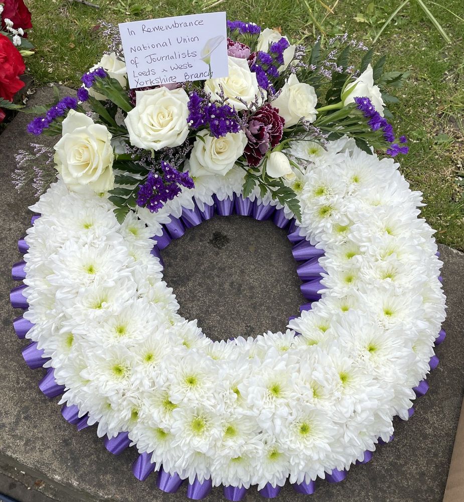 Wreath with card reading: In Remembrance - National Union of Journalists Leeds & West Yorkshire Branch