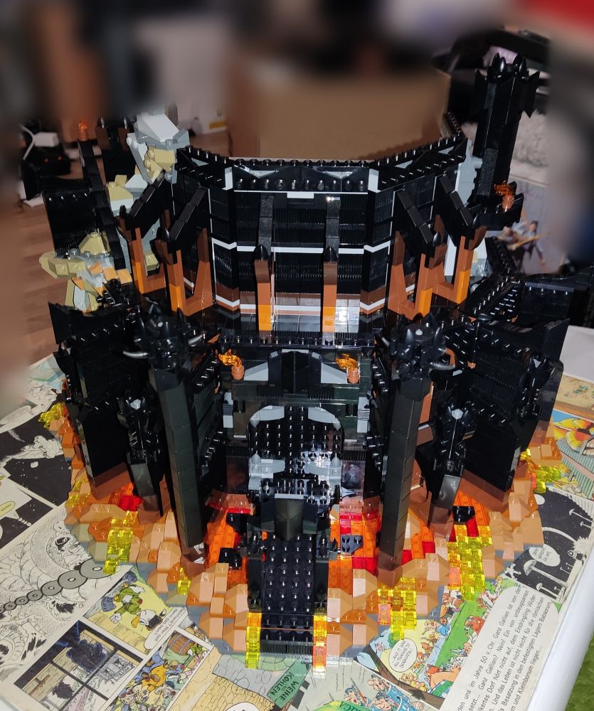 The first floor and second floor joined together! 
Wait, fuck, I was constantly talking about the first floor (by German measure) when I meant the (American) second floor. 
Ok, the ground floor and the first floor have been joined together... 
We see the outside, there's the gate and the many spires, and more spires...