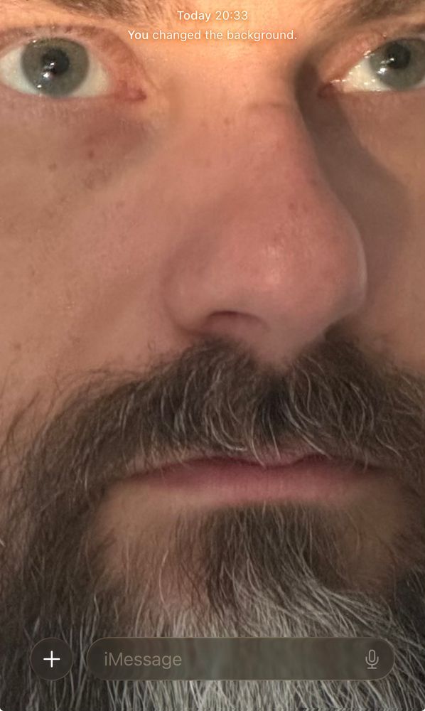 A messages window where the background is a closeup of my face