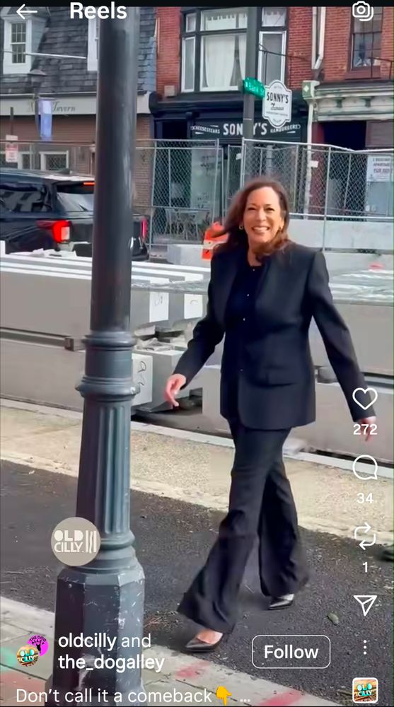 Kamala Harris walking across a bike lane in Old City, Philadelphia.