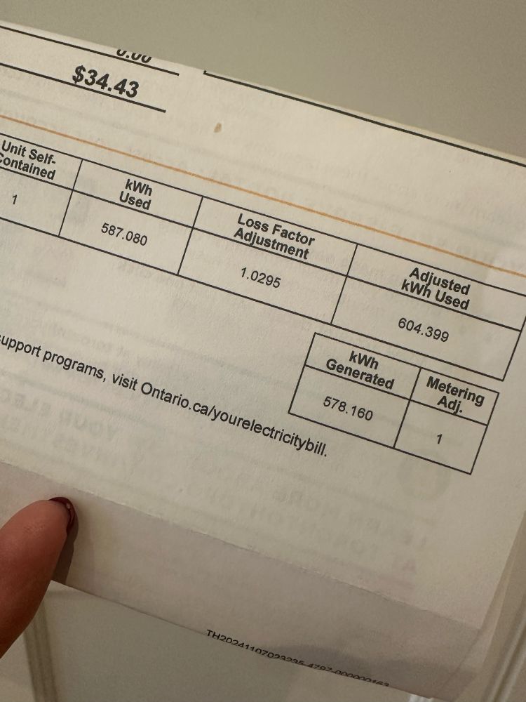 A section of a Toronto Hydro bill showing KWH used (587) and KWH generated (578)