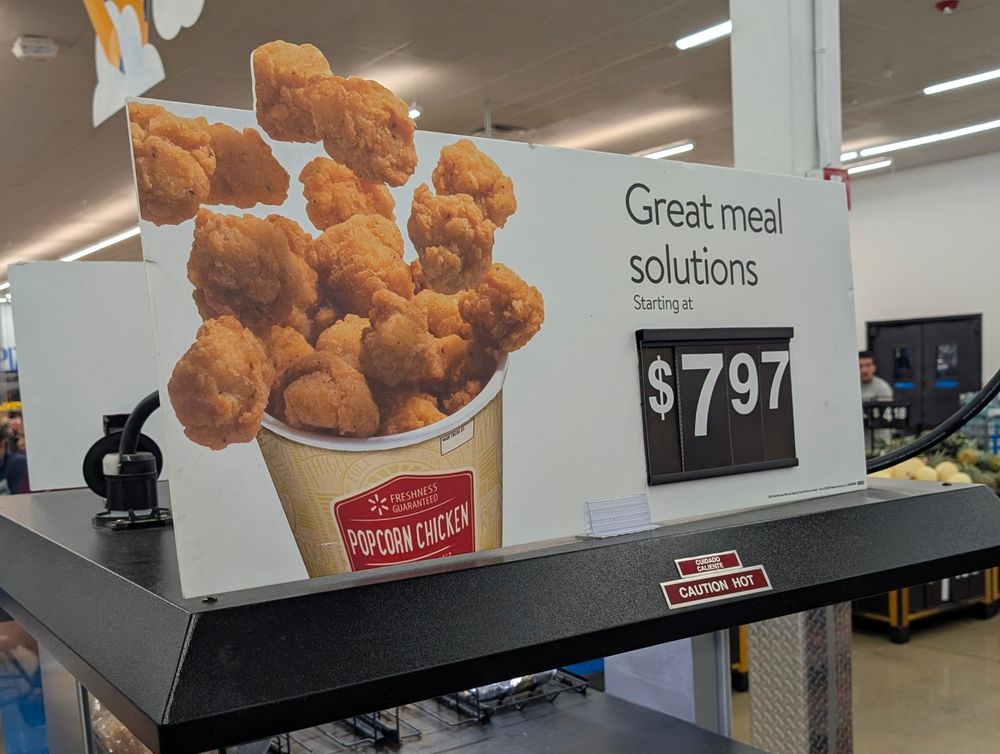 an advertisement for popcorn chicken with the tagline "great meal solutions"