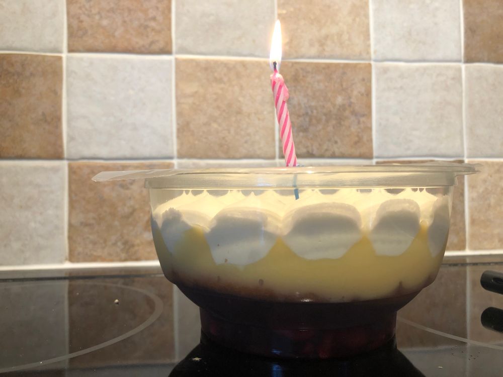 Trifle with a candle 