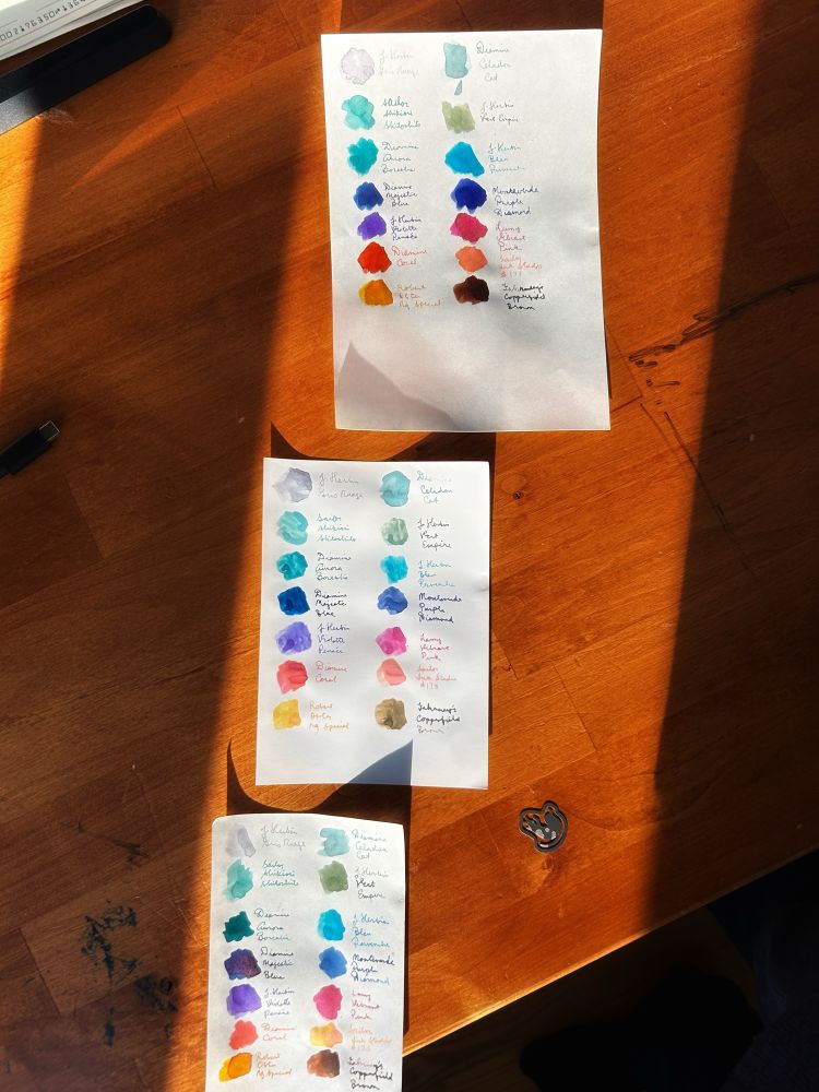 All three types of paper together. From top to bottom, Sheep Clouds Bond; Smooth Art Paper; Yamamoto Bank Paper Takasago Premium. 

The bank paper is probably the best; I like the unique texture of the art paper, but it does REALLY funky things to the ink (and the little slip that comes with the sets says that it’s not suitable for dip pens anyway!); and although I do like how the SCB handles sheen in particular, it’s rougher than I’d like. 