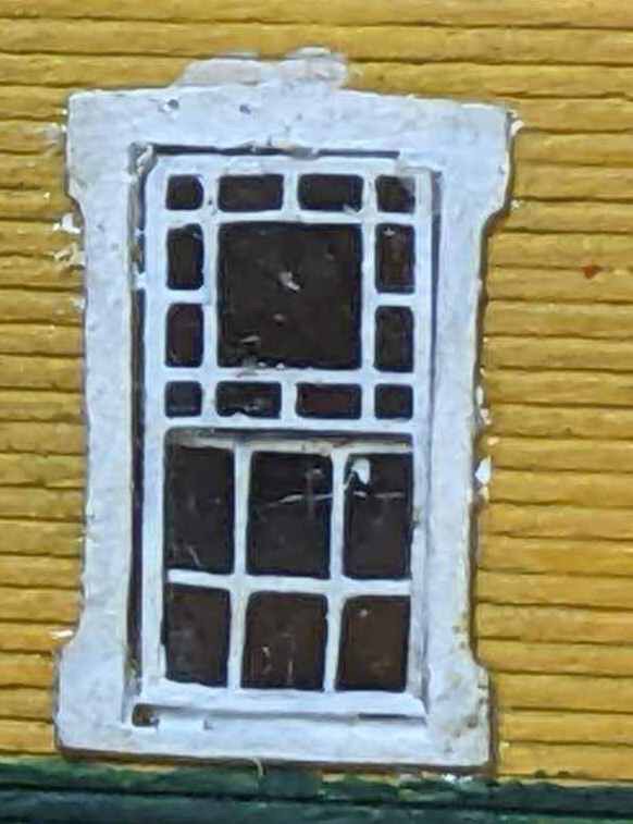 Laser resin impregnate paper. Width of windows 0.225 inches yes double hung upper panes tinted.