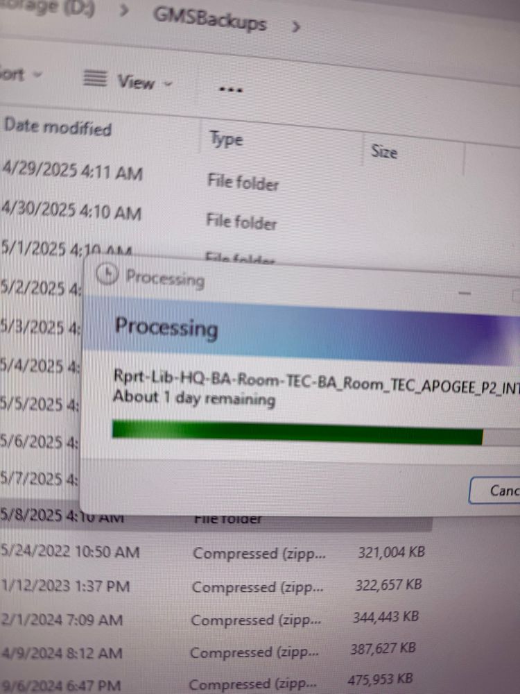 A windows progress bar that says About 1 day remaining