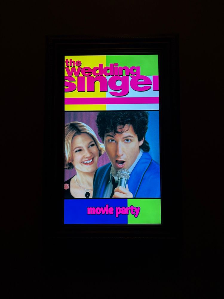 a movie poster for The Wedding Singer