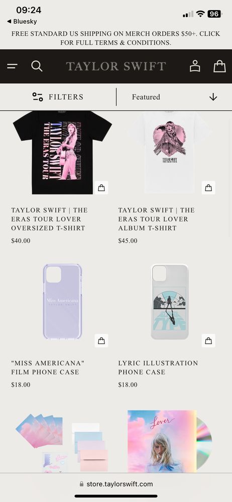 A screenshot from Taylor Swift’s US store section for Lover. It features six products:
A black oversized t shirt from the Eras tour with Taylor in one of her Lover bodysuits playing guitar, a white Lover album t shirt, a purple ‘Miss Americana and the Heartbreak Prince’ phone case, a white phone case with the lyrics from The Man ‘to be an alpha type’ with Taylor silhouette in her Eras Tour ‘The Man’ jacket, the Lover album Valentine’s Day cards & stickers and the standard edition Lover physical album in CD format.
From this screenshot, only the CD is available also on the U.K. store.