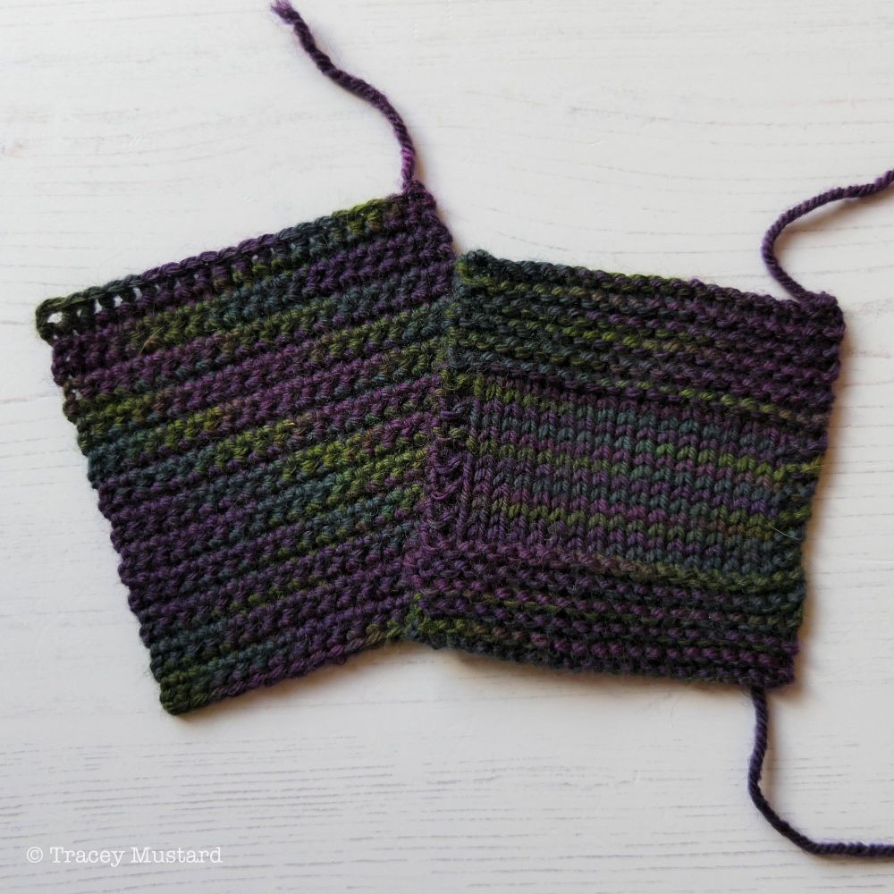 A crocheted swatch on the left is overlapped by a knitted swatch on the right. The dark neon colours in the Voidbow yarn move through the fabric in a very pleasing way, which looks a little bit like spilt petrol.