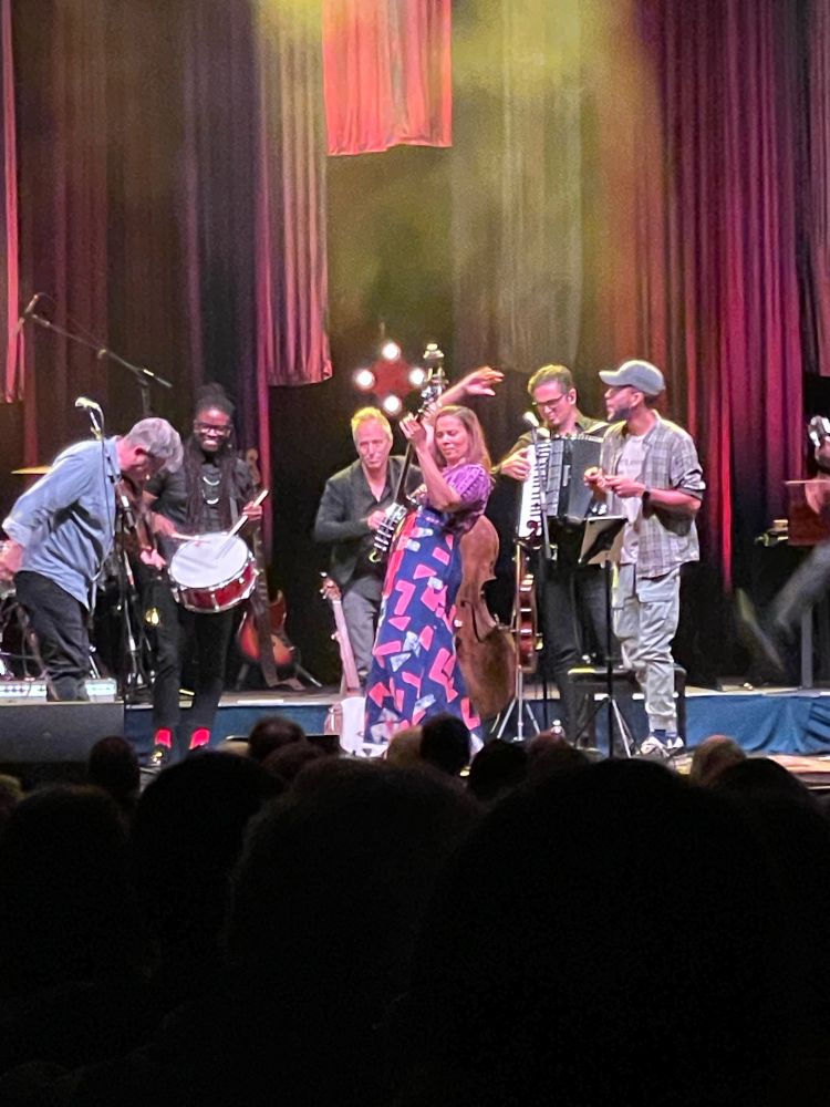 Band on stage at the end of a set