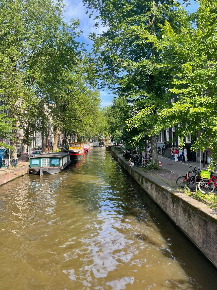 Photo of central Amsterdam canal in the sunshine 