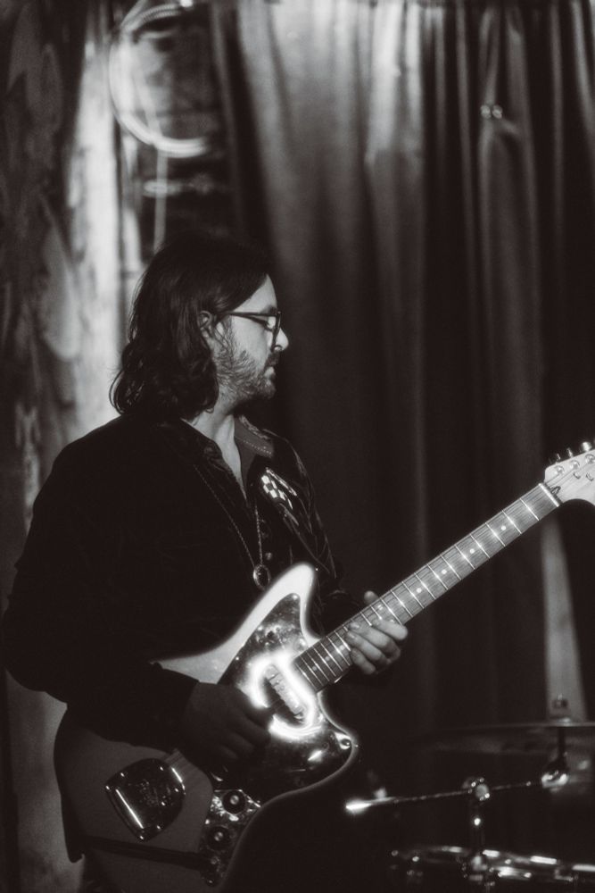 JT of Slow Motion Sadface Playing Guitar