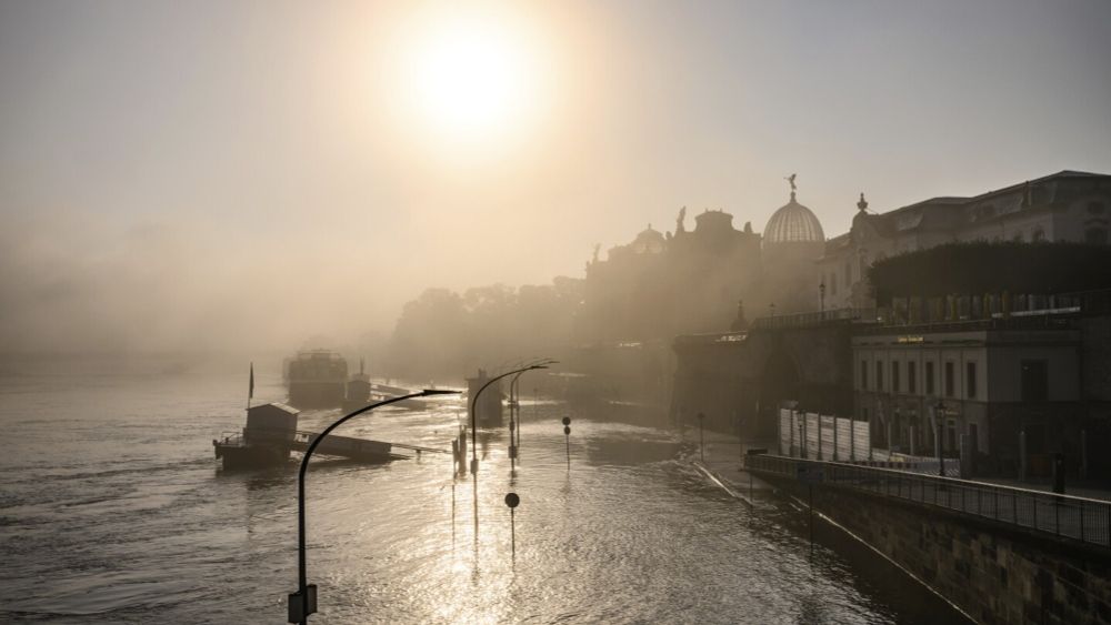 EU warns deadly flooding and wildfires show climate breakdown is fast becoming the norm