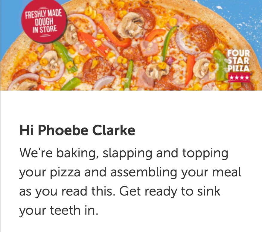 An email from Four Star Pizza saying that they are "baking, slapping, and topping" my pizza as I read the email.