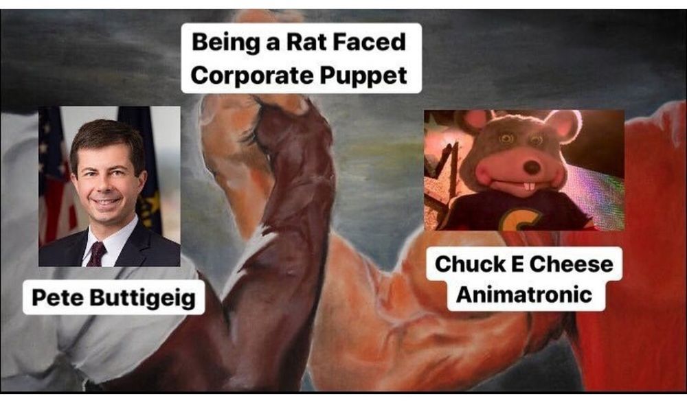 Two muscular men clasp arms. One arm is captioned “Pete Buttigeig”, the other with “Chuck E Cheese Animatronic”. The point where the men’s hands clasp is captioned “Being a Rat Faced Corporate Puppet”.