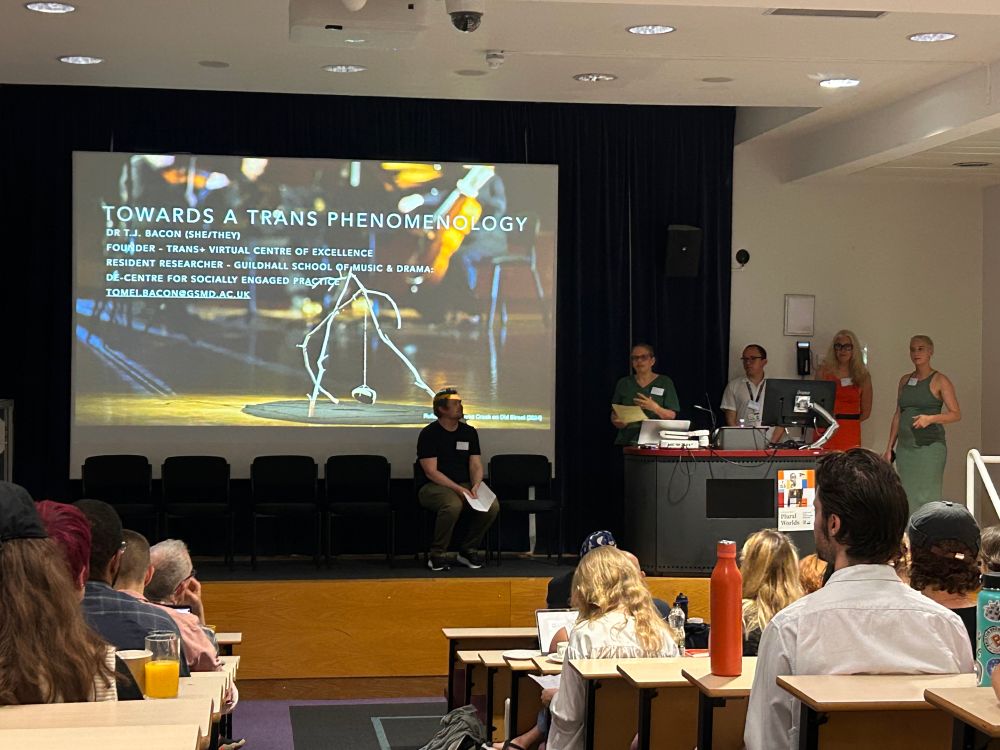 Five speakers on stage welcoming all the Encounters - names:  Kate Lacey (CHASE), Joel McKim (Birkbeck) and the Birkbeck-CHASE organising team: Rodrigo Arciniega Ponce, Elizabeth Fullerton & Kae Rose 