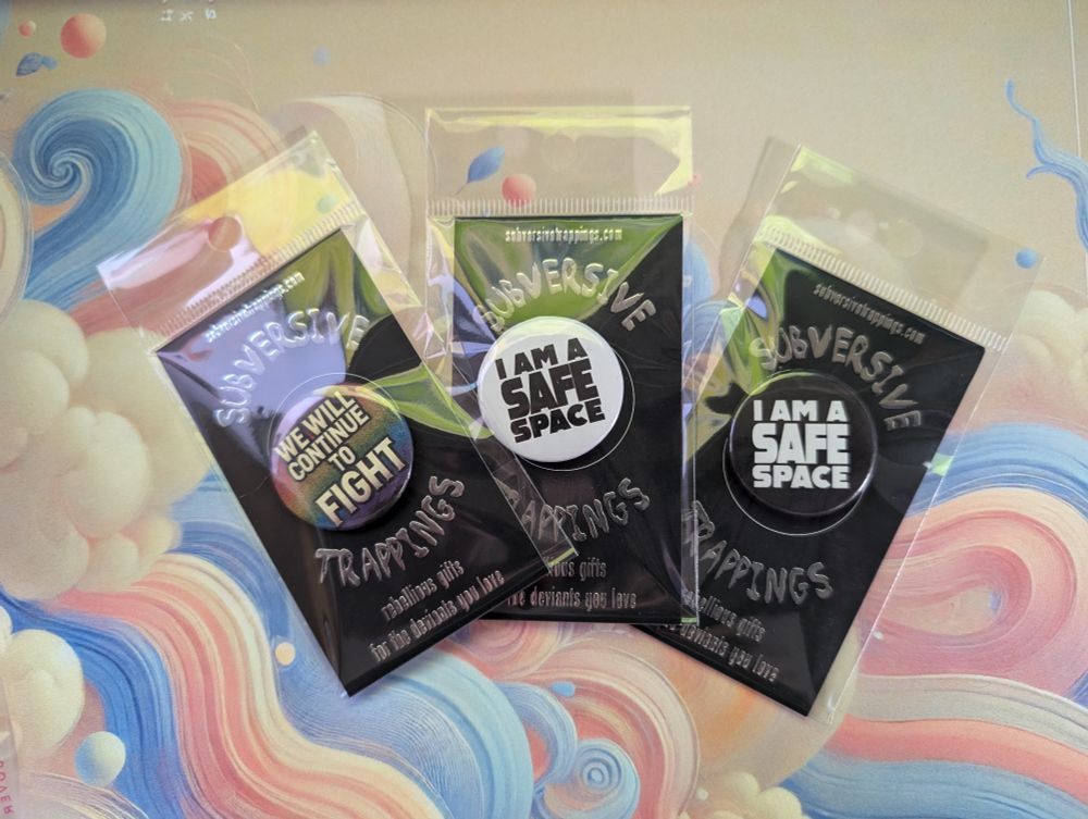 A picture of 3 different buttons.