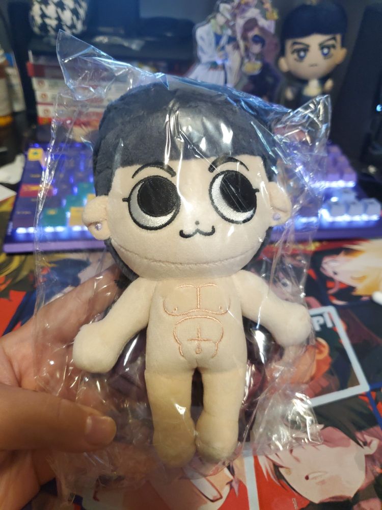 Picture of Coralus' Juju plush with no clothes. You can see the sitching of his cute little abs.