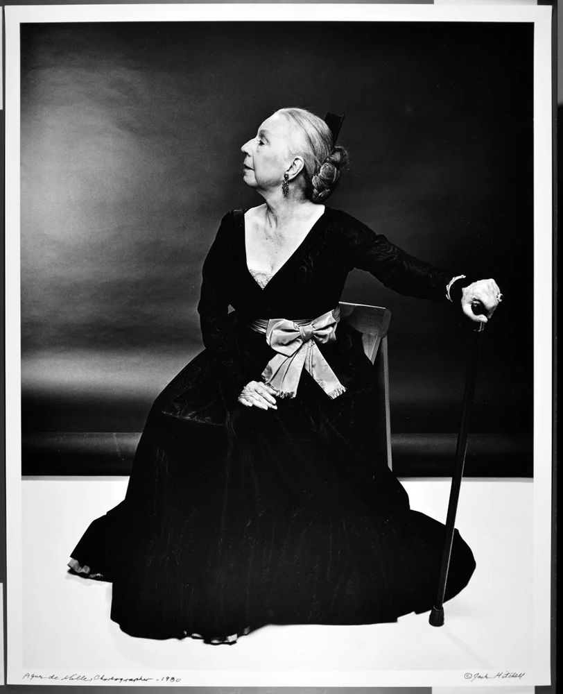 Black and white portrait of Agnes de Mille seated