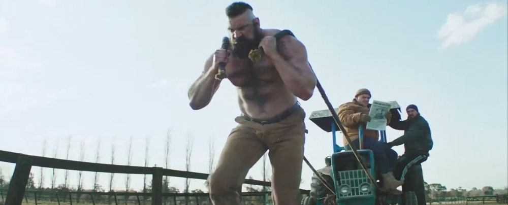 A still from the Street Fighter [2026] trailer of a hairy, shirtless Zangief (Olivier Richters).