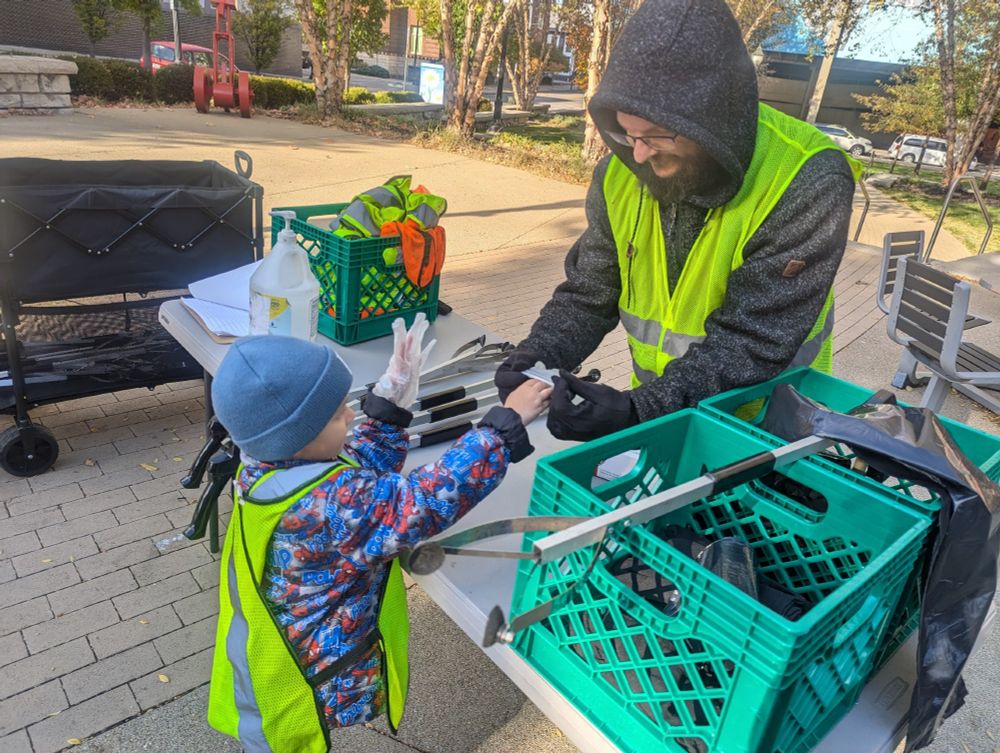 Lance helping his son get geared up