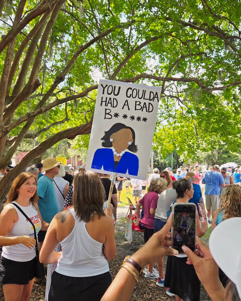 Sign of Kamala Harris and says, "You coulda had a bad bitch." Referencing a 2020 SNL skit.