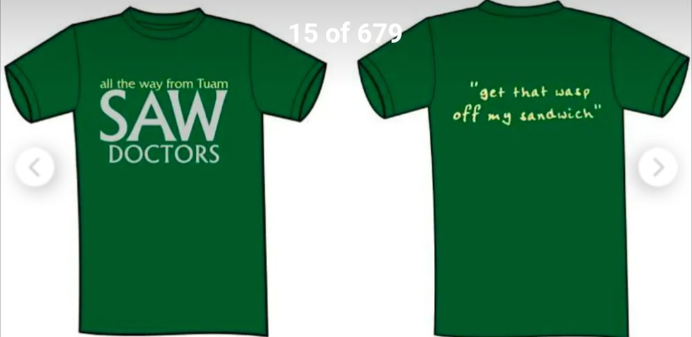 Image of a green T-shirt, front reads 

"all the way from Tuam 
Saw Doctors"

The back is a quote from the song Hay Rap that reads, "get that wasp off my sandwich"