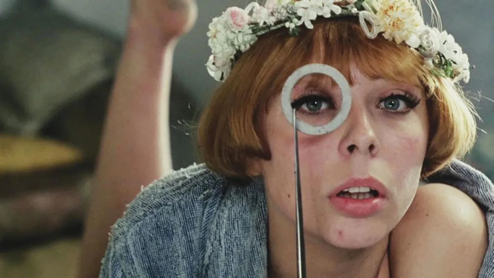 A pretty red head with a monocle 