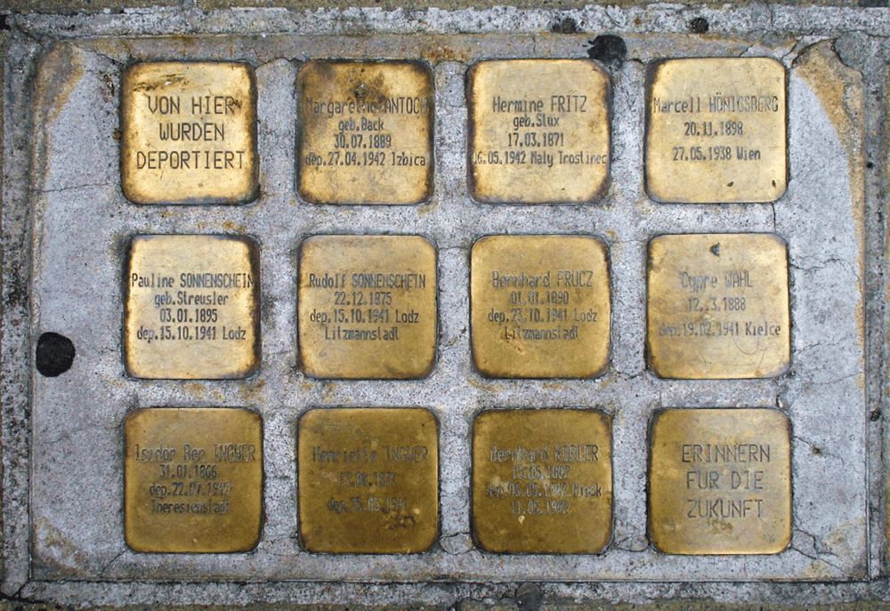 12 Stolpersteine / 12 stumbling blocks commemorating 10 people deported by the Nazis