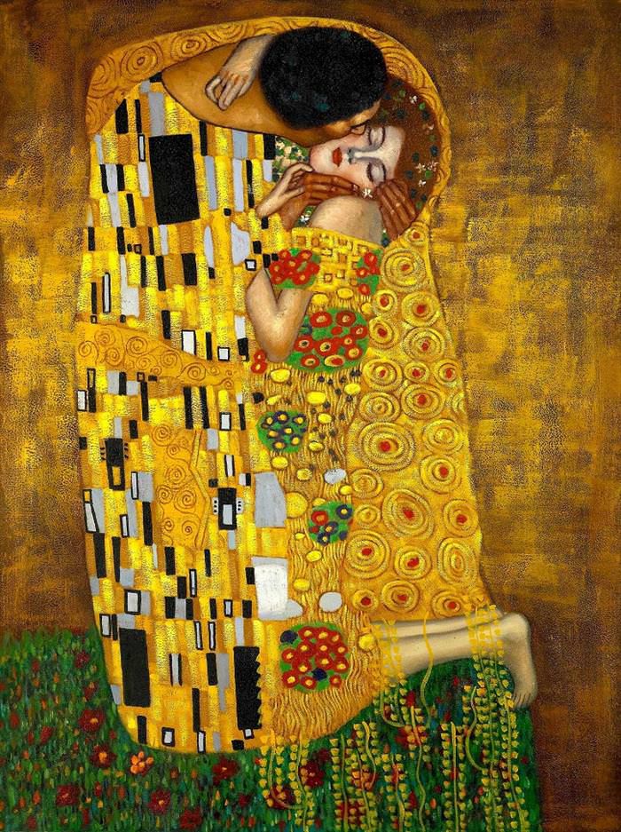 Gustav Klimt’s painting The Kiss. It is mostly gold in color and it depicts two lovers embracing in a kiss. Their body positions mirror the cats’ body positions in the previous image. 