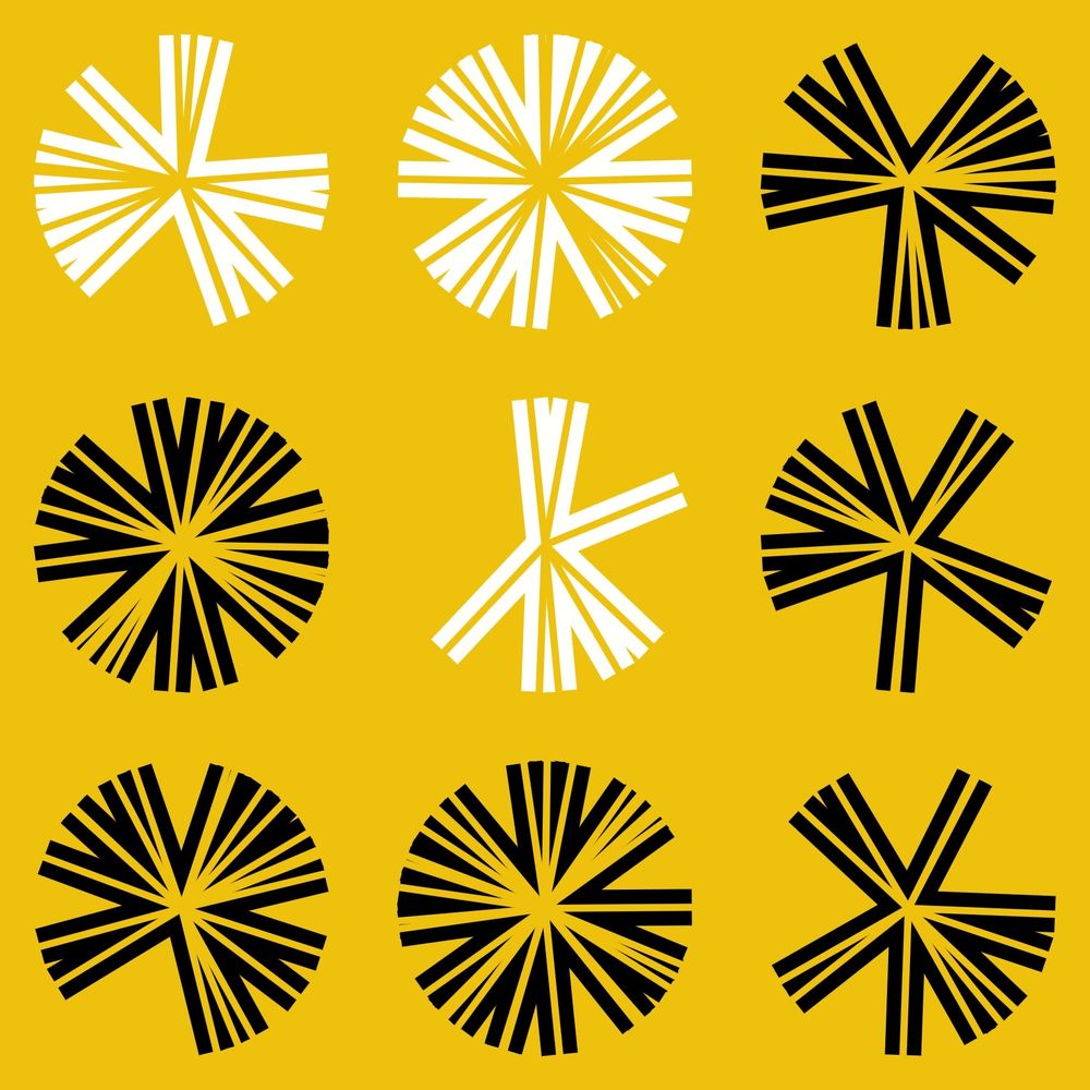 Series of dandelion-like circular shapes in white and black on yellow